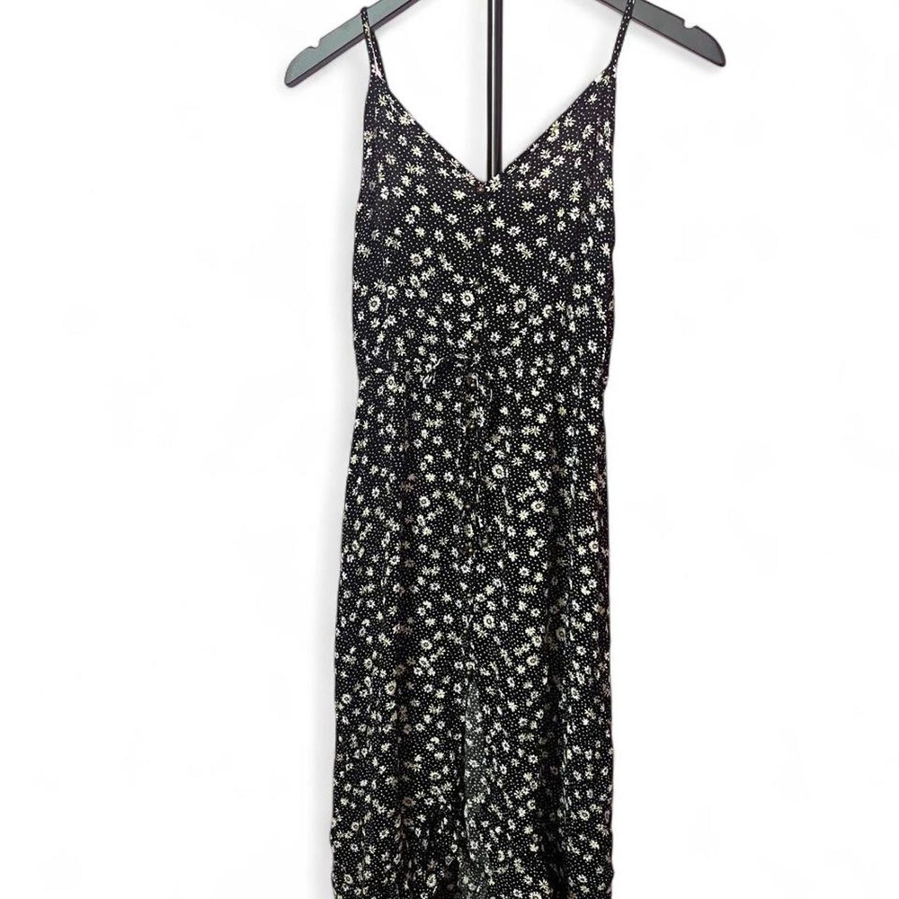 Black & white floral maxi dress with spaghetti straps and ruffled hem